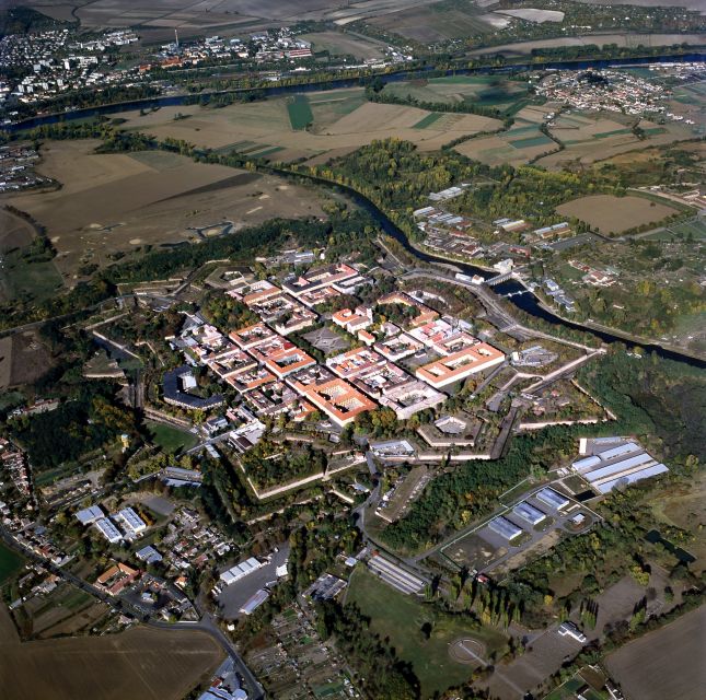 From Prague: All-inclusive Bus Tour to Terezin Memorial - Walking, comfort, and what to pack so you can focus