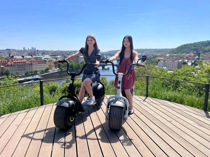 Prague: Fat Tire or Regular Scooter Tour with A Local Guide - Entering Prague by e-scooter instead of foot power