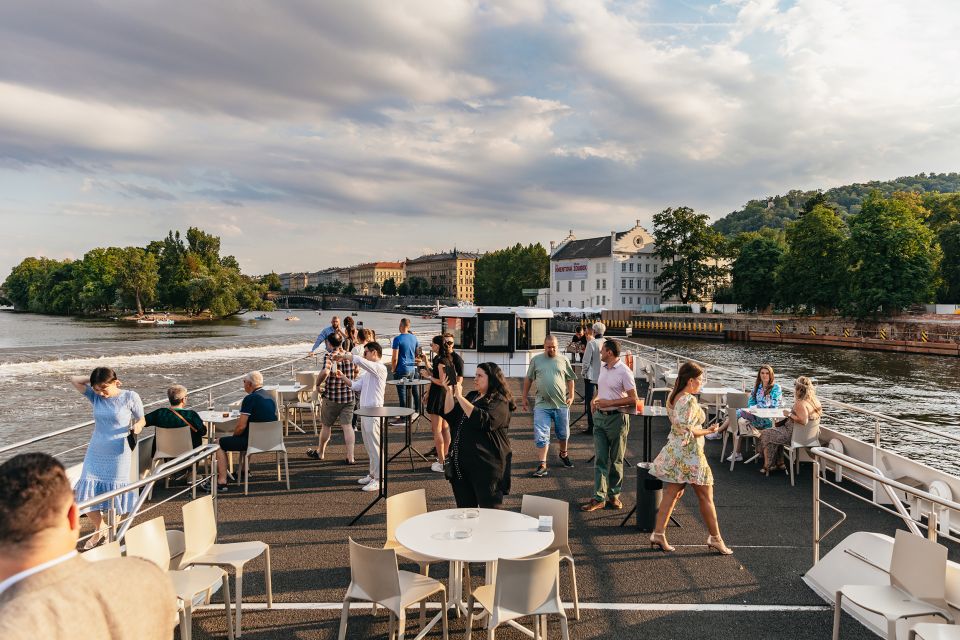 Prague: Sightseeing Dinner Cruise on Open-Top Glass Boat - Dinner onboard: Czech classics, international variety, and dietary options