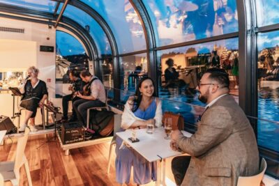 Prague: Sightseeing Dinner Cruise on Open-Top Glass Boat - The open-top glass boat: comfort, quiet, and real photo time