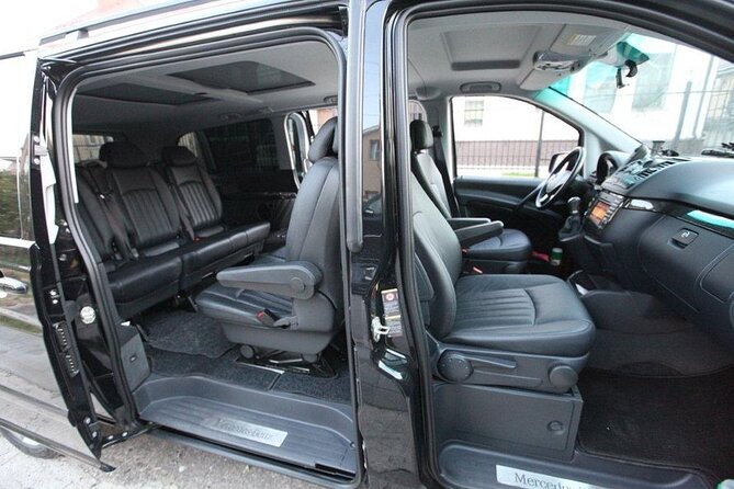 Private Transfer from Prague Airport to Prague City Hotels 1 - 7 pax - The Prague Hotel Ride: A/C, WiFi, and Group Comfort for Up to 7
